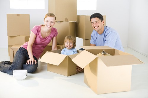 Removal van and moving boxes in a Lamorbey residential street