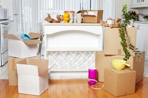Professional office removals team handling furniture and IT equipment in Lamorbey