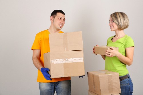 Local removals team managing a flat move in Lamorbey near residential buildings